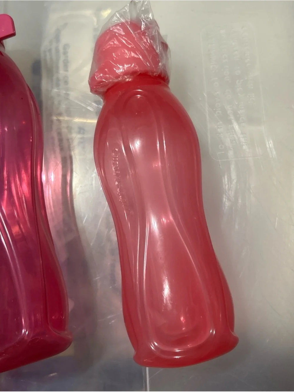 Tupperware Red and Pink Water Bottles Set